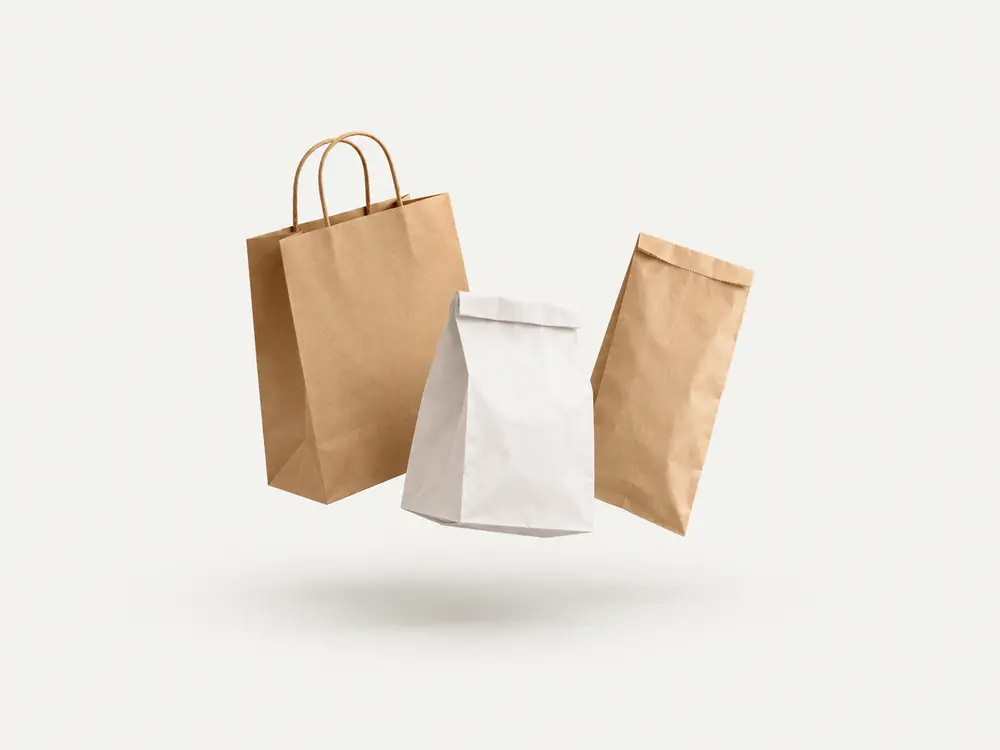 Kraft and white paper carrier bags